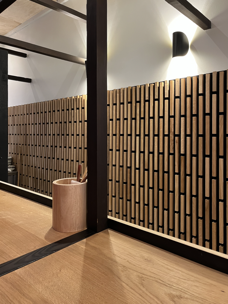 habillage mural bois design découvrez comment intégrer un mur en bois design dans votre intérieur pour une ambiance chaleureuse et moderne. idées, conseils et inspirations pour sublimer votre décoration.