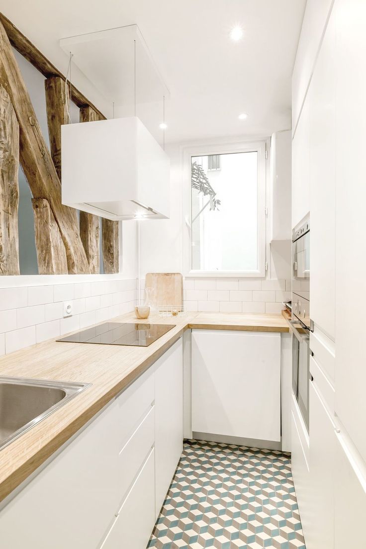 Transformer une cuisine étroite à Paris 13 grâce à la rénovation transformez votre cuisine étroite à paris 13 grâce à nos solutions de rénovation sur-mesure. optimisez l